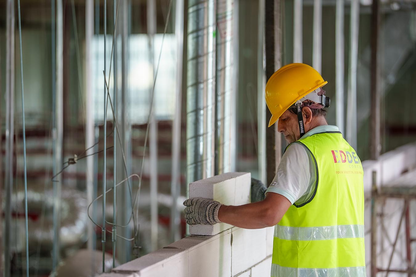 Interior contractor working on the wall